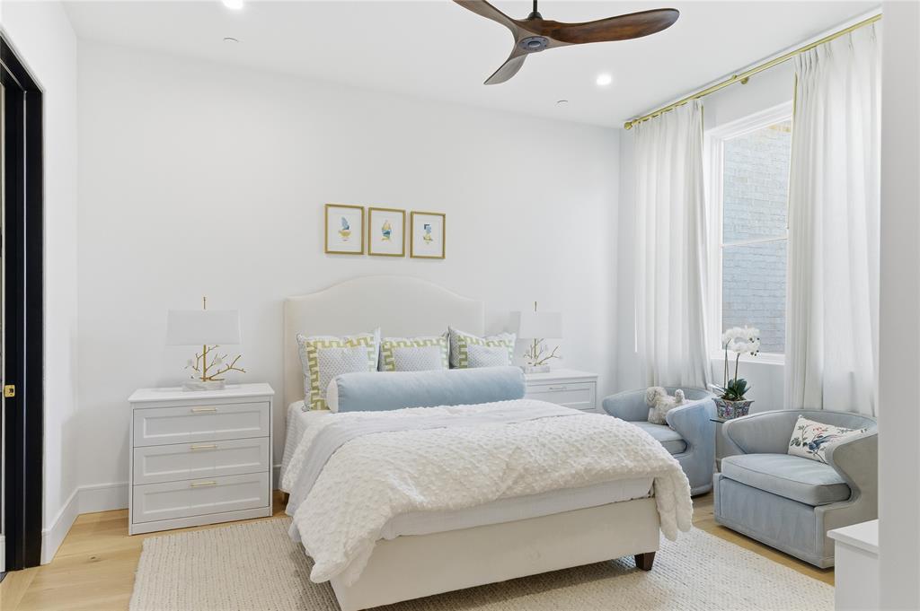 320 O Connor Ridge Boulevard, Unit 22 Irving, TX 75038 - Photo 25 of 34 a bedroom with a bed and a couch