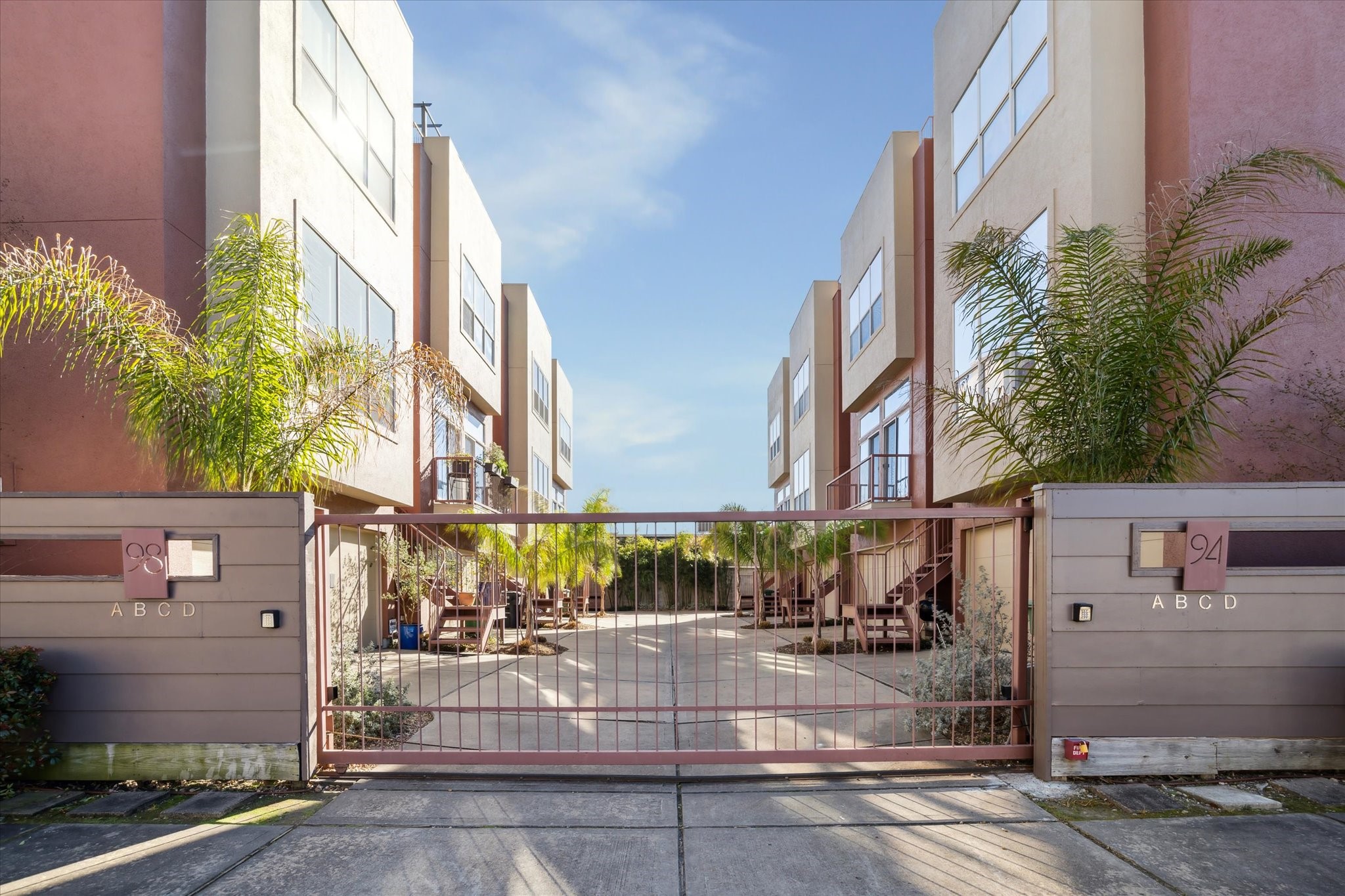 94 Drew Street, Unit C Houston, TX 77006 - Photo 2 of 29 Gated enclave in Montrose offering refined lock-and-leave living in one of Houston’s most vibrant urban neighborhoods.
