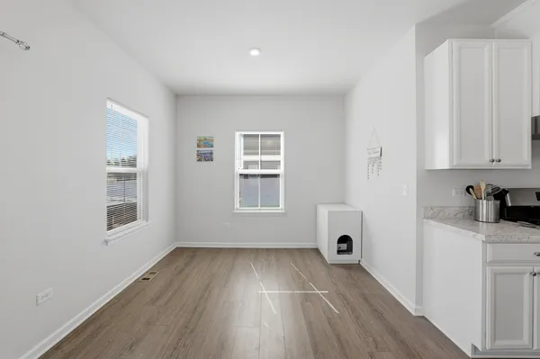 a view of livingroom with hardwood floor and window