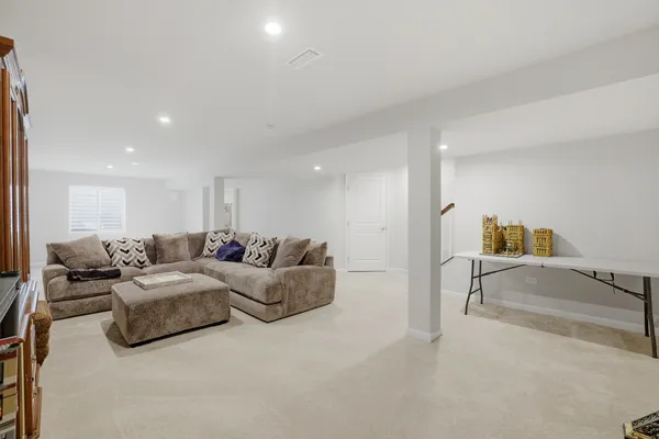 a living room with furniture and a couch