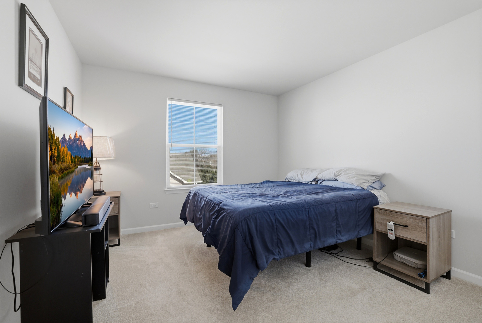 7232 Great Northern Trail Union, IL 60180 - Photo 26 of 48 a bedroom with a bed and a flat screen tv