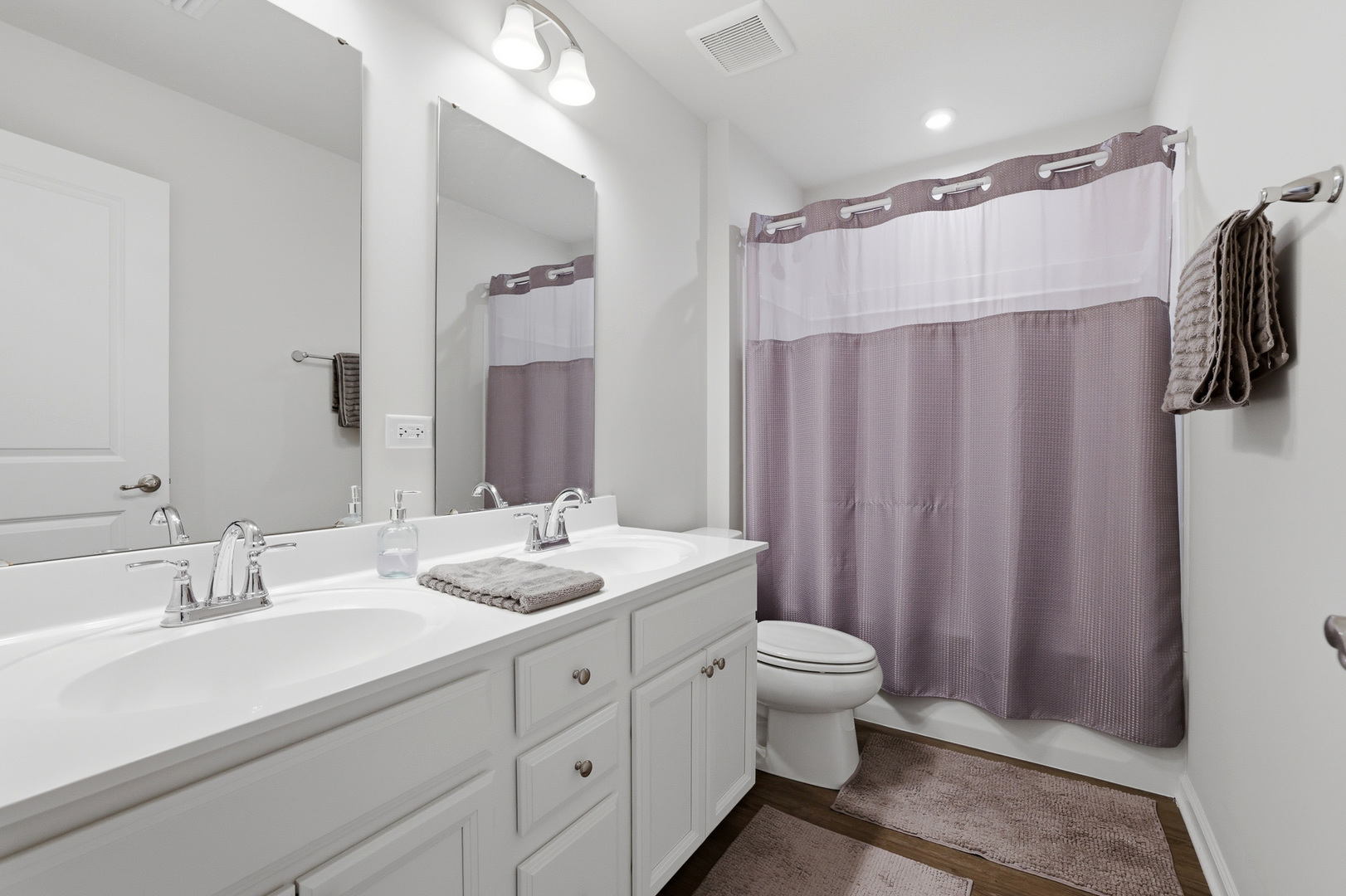 7232 Great Northern Trail Union, IL 60180 - Photo 28 of 48 a bathroom with a double vanity sink toilet and shower