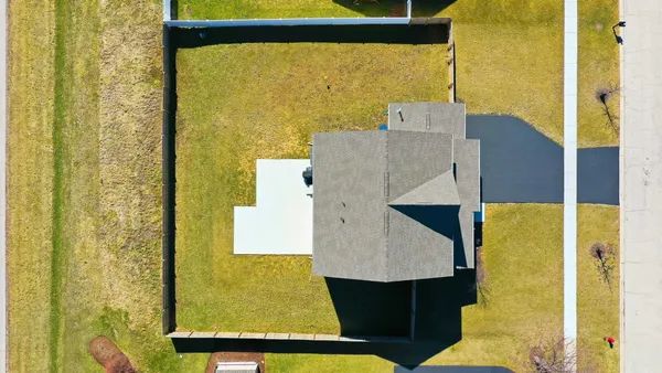 swimming pool view with a lake view