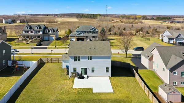 a view of a swimming pool with seating area