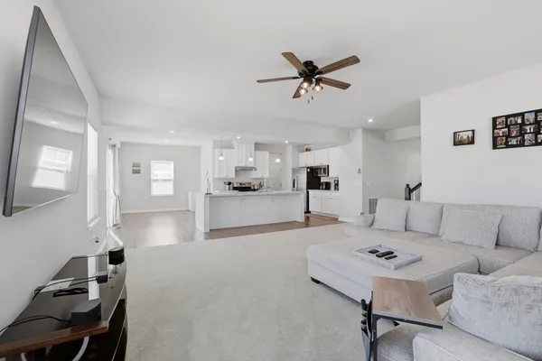 a living room with furniture and a table