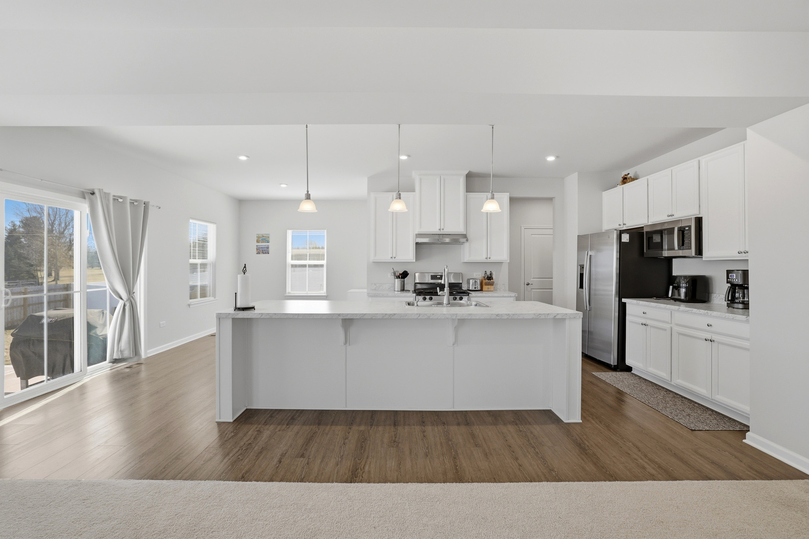 7232 Great Northern Trail Union, IL 60180 - Photo 10 of 48 a view of kitchen with stainless steel appliances refrigerator oven and microwave