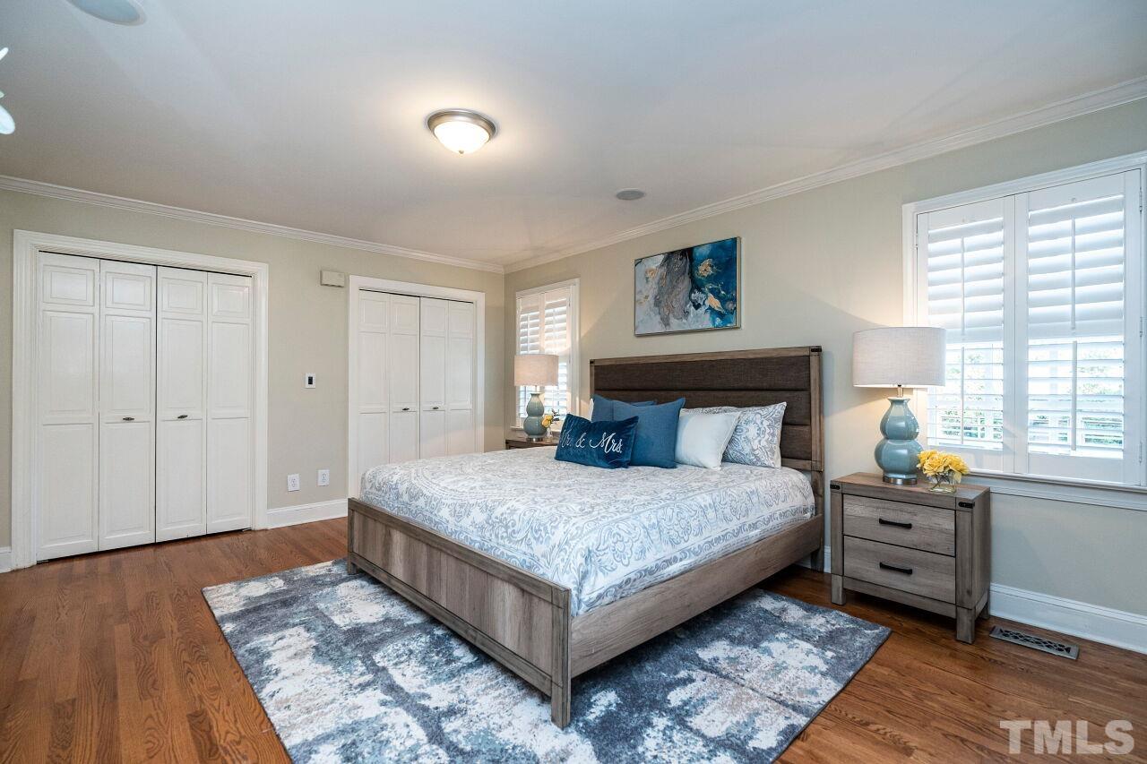 3434 Churchill Road Raleigh, NC 27607 - Photo 13 of 30 a bedroom with a bed and a window