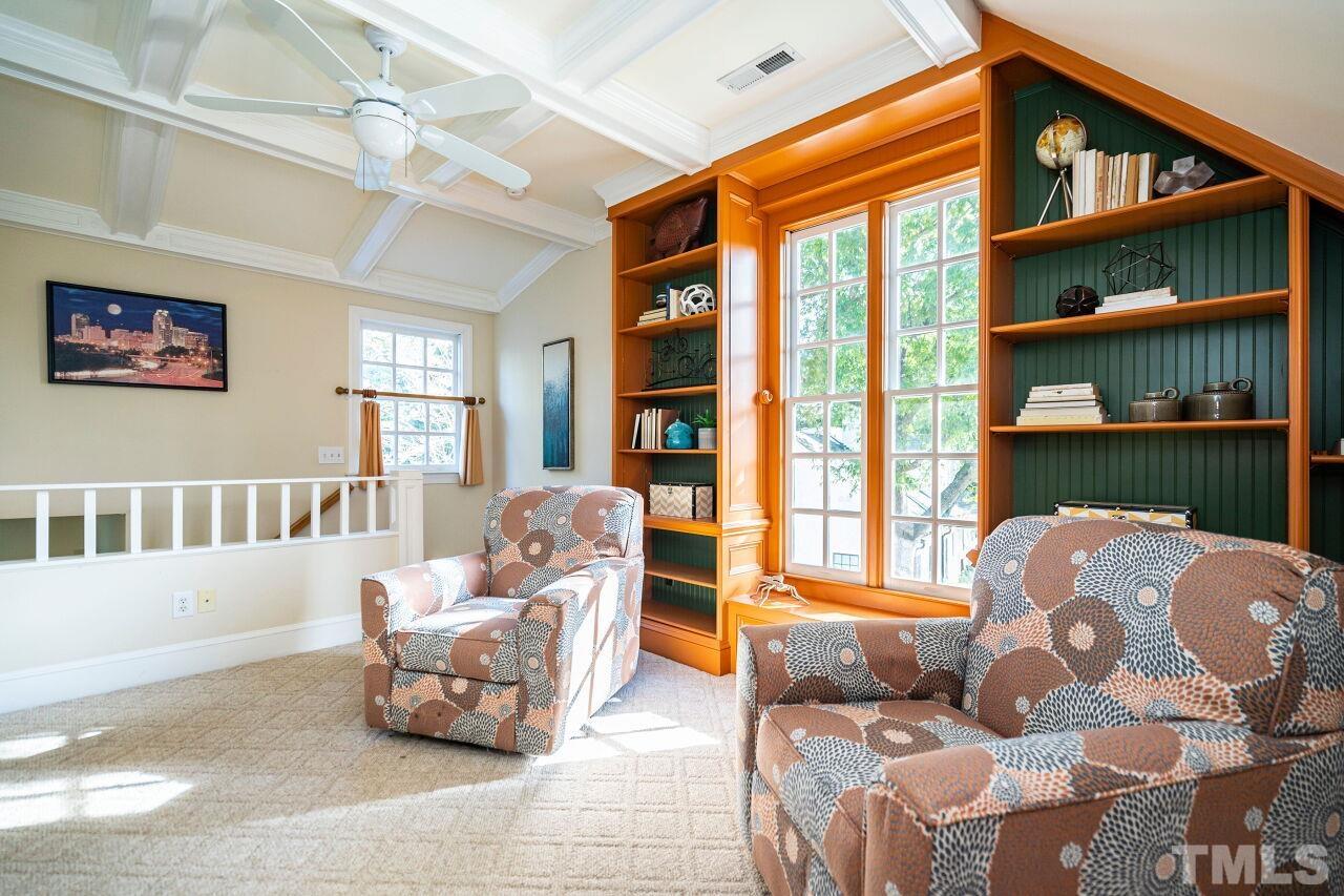 3434 Churchill Road Raleigh, NC 27607 - Photo 20 of 30 a living room with furniture and a window