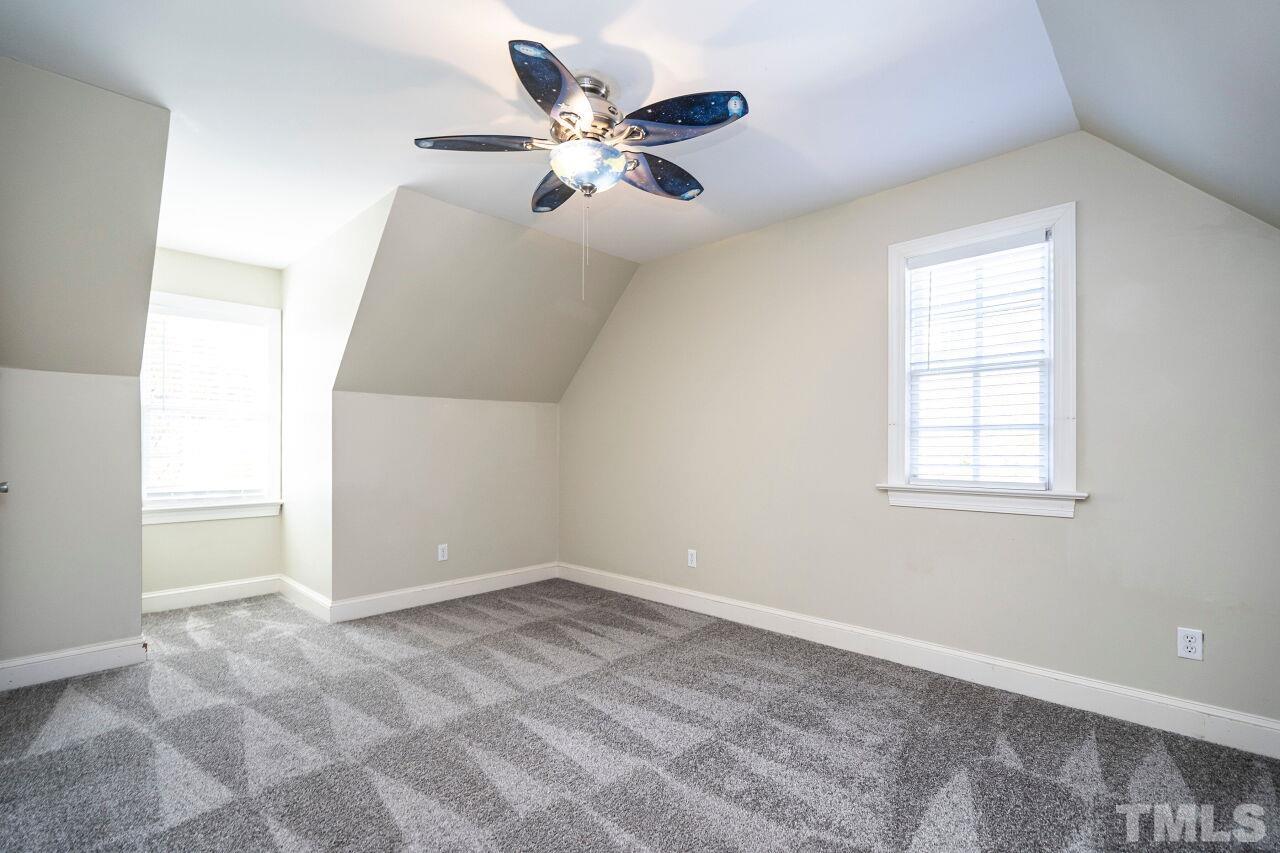 3434 Churchill Road Raleigh, NC 27607 - Photo 23 of 30 wooden floor in an empty room with a window