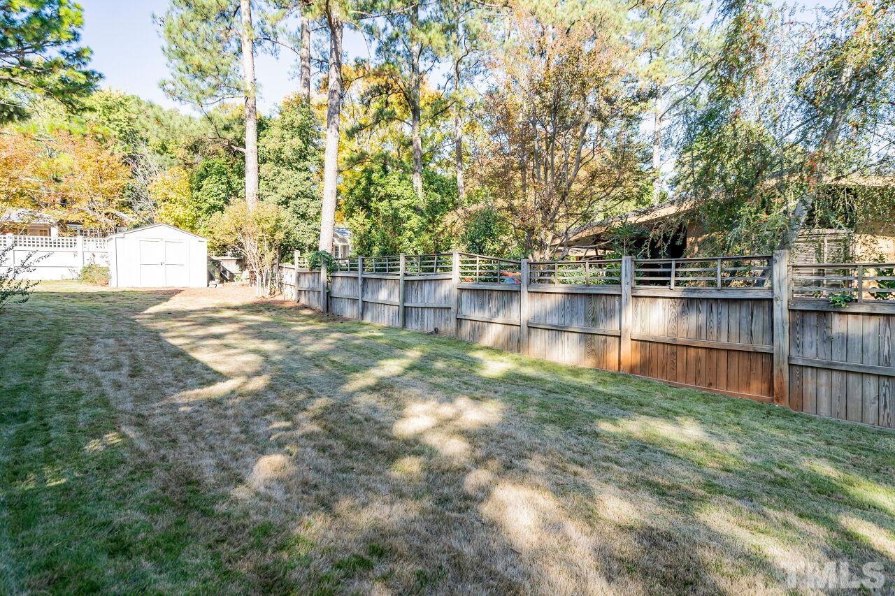 3434 Churchill Road Raleigh, NC 27607 - Photo 27 of 30 a view of yard with trees around