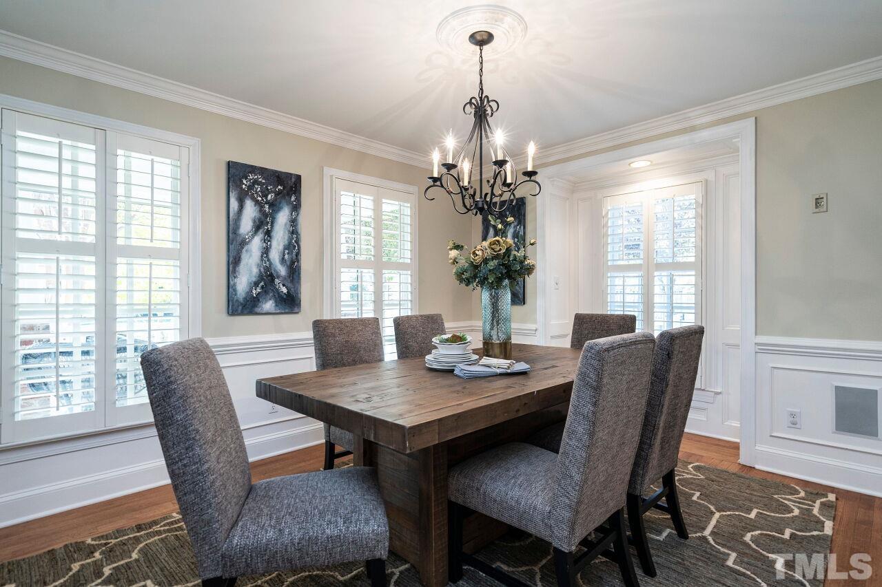 3434 Churchill Road Raleigh, NC 27607 - Photo 4 of 30 a view of a dining room with furniture window and outside view