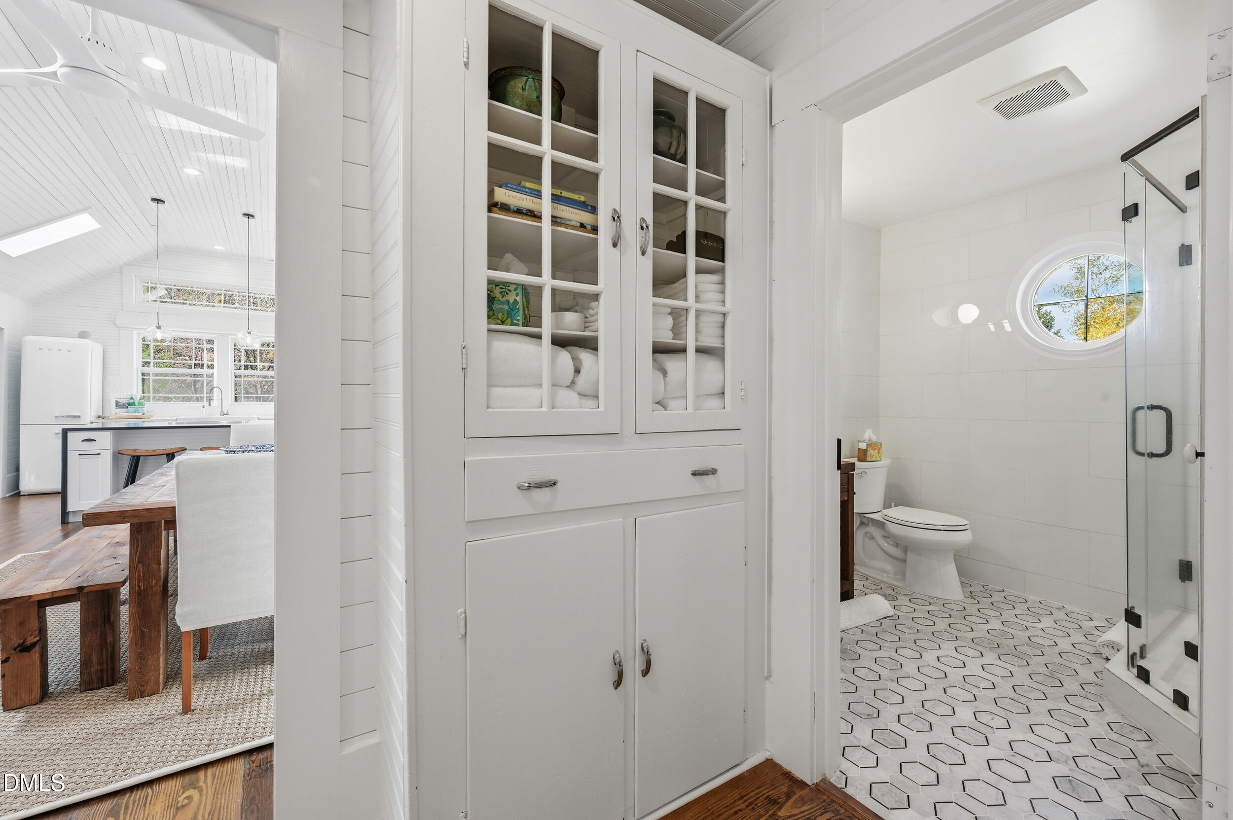 1451 Hawkins Road Hurdle Mills, NC 27541 - Photo 38 of 69 a bathroom with a toilet and a shower