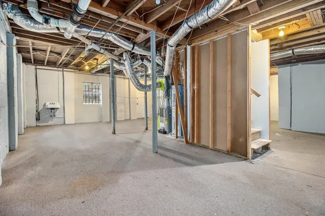 a view of a room with wooden walls