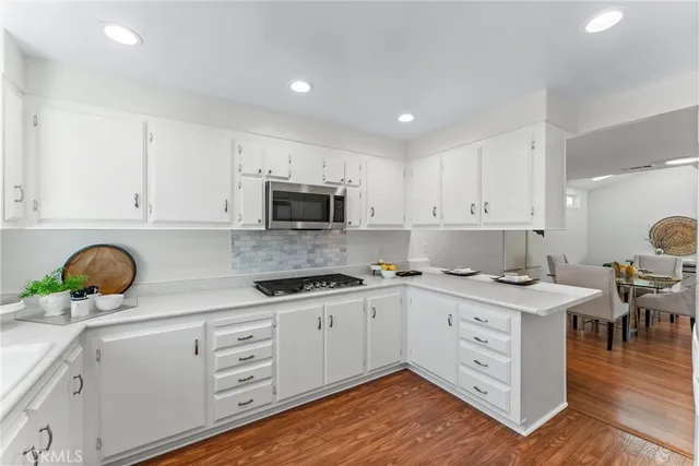 a bedroom with a bed and a table in it