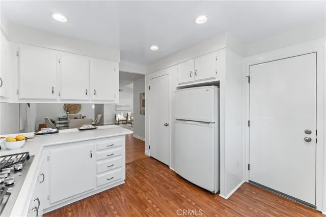 a bedroom with bed and a window