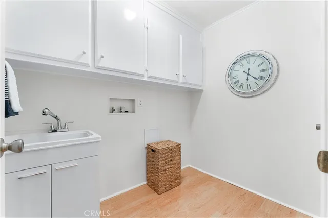 a bathroom with a shower and a sink