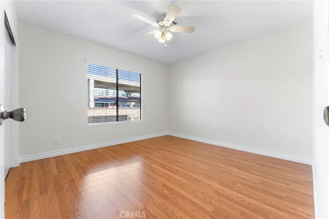 a swimming pool with outdoor seating and yard