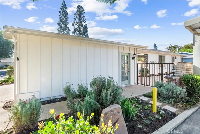 a view of a livingroom with furniture and tub
