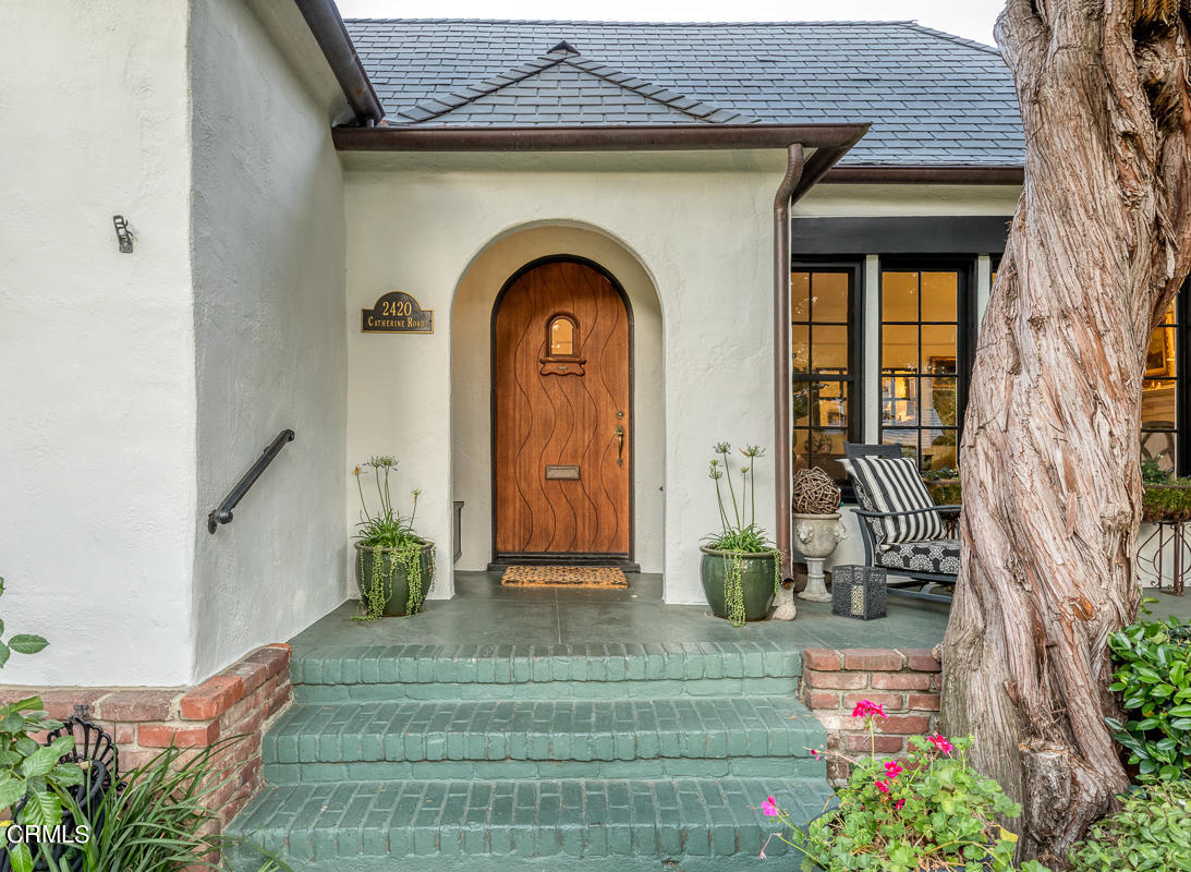 2420 Catherine Road Altadena, CA 91001 - Photo 3 of 43 a front view of a house with garden