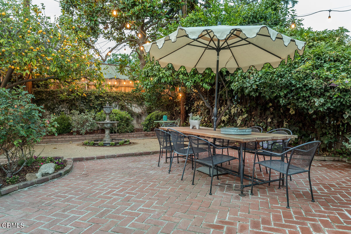 2420 Catherine Road Altadena, CA 91001 - Photo 34 of 43 an outdoor space with furniture and umbrella