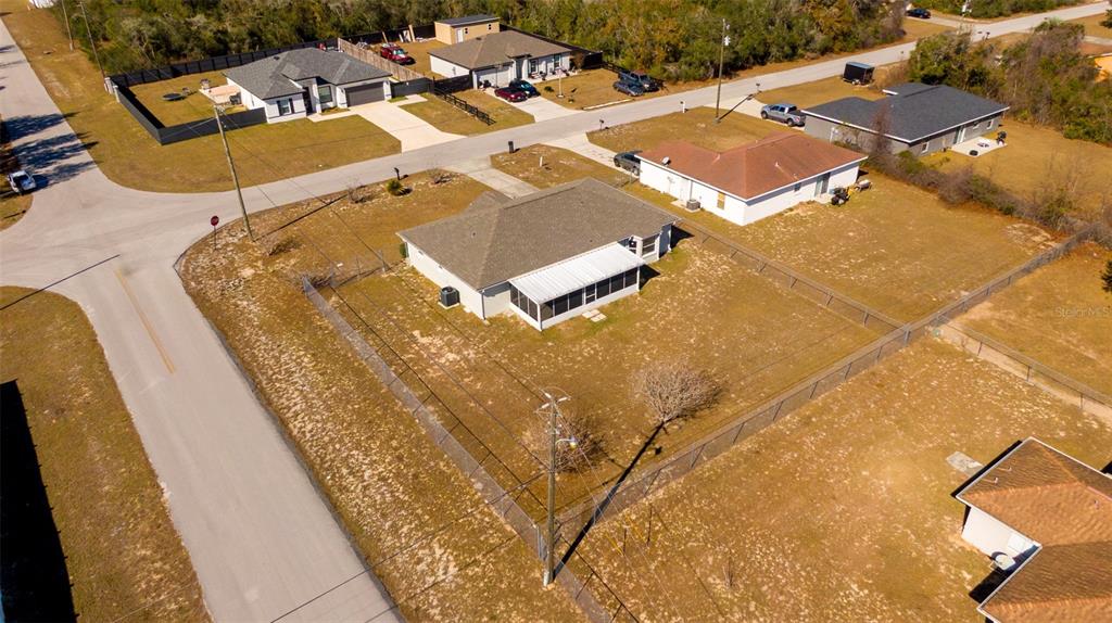 15651 Southwest 19th Terrace Ocala, FL 34473 - Photo 7 of 68 an aerial view of a swimming pool