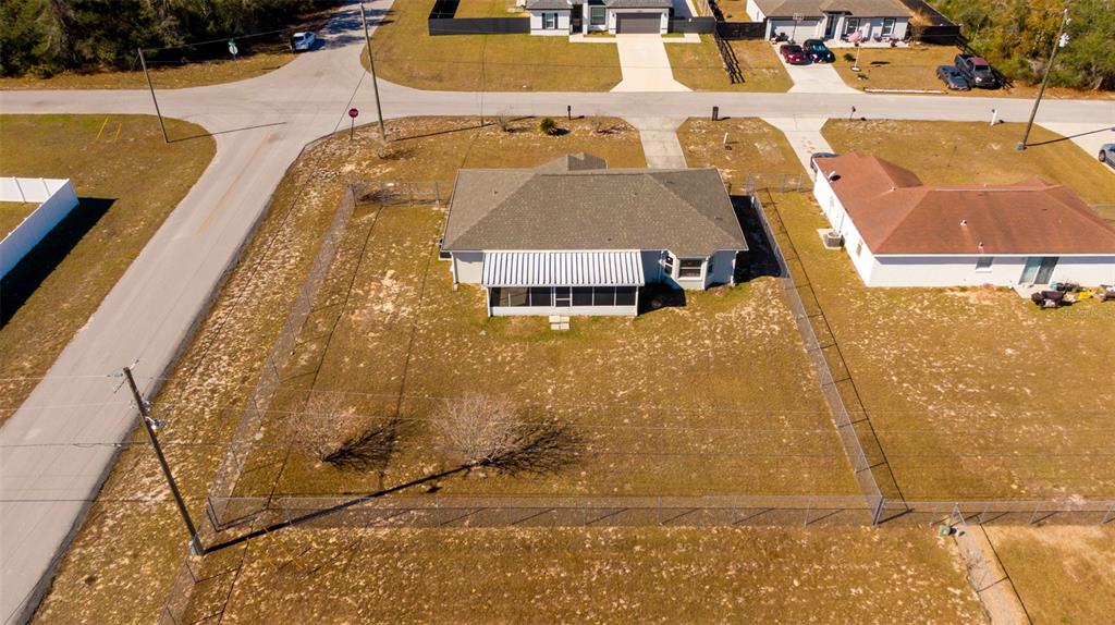 15651 Southwest 19th Terrace Ocala, FL 34473 - Photo 8 of 68 an aerial view of residential houses with outdoor space