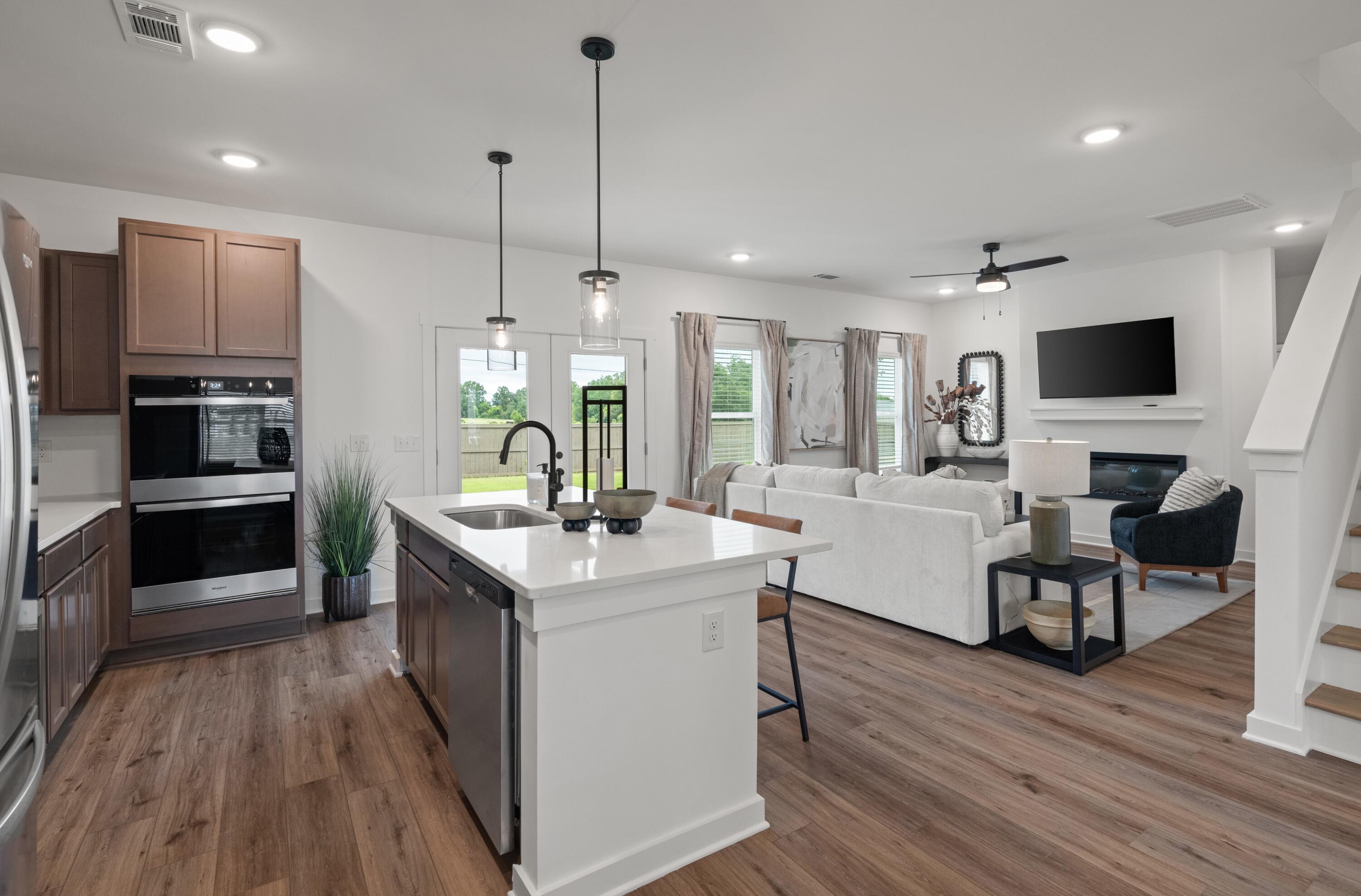 Lot 10 Clarke Hill Road Freeport, FL 32439 - Photo 4 of 52 a kitchen with a sink appliances and wooden floor