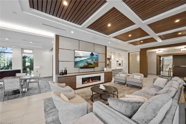 a patio with a table and chairs