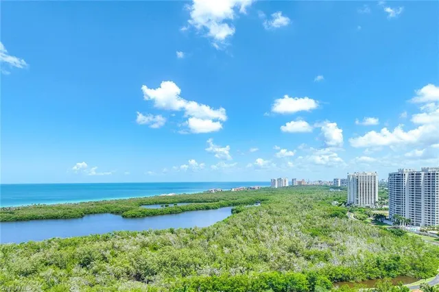 a view of a city with an ocean