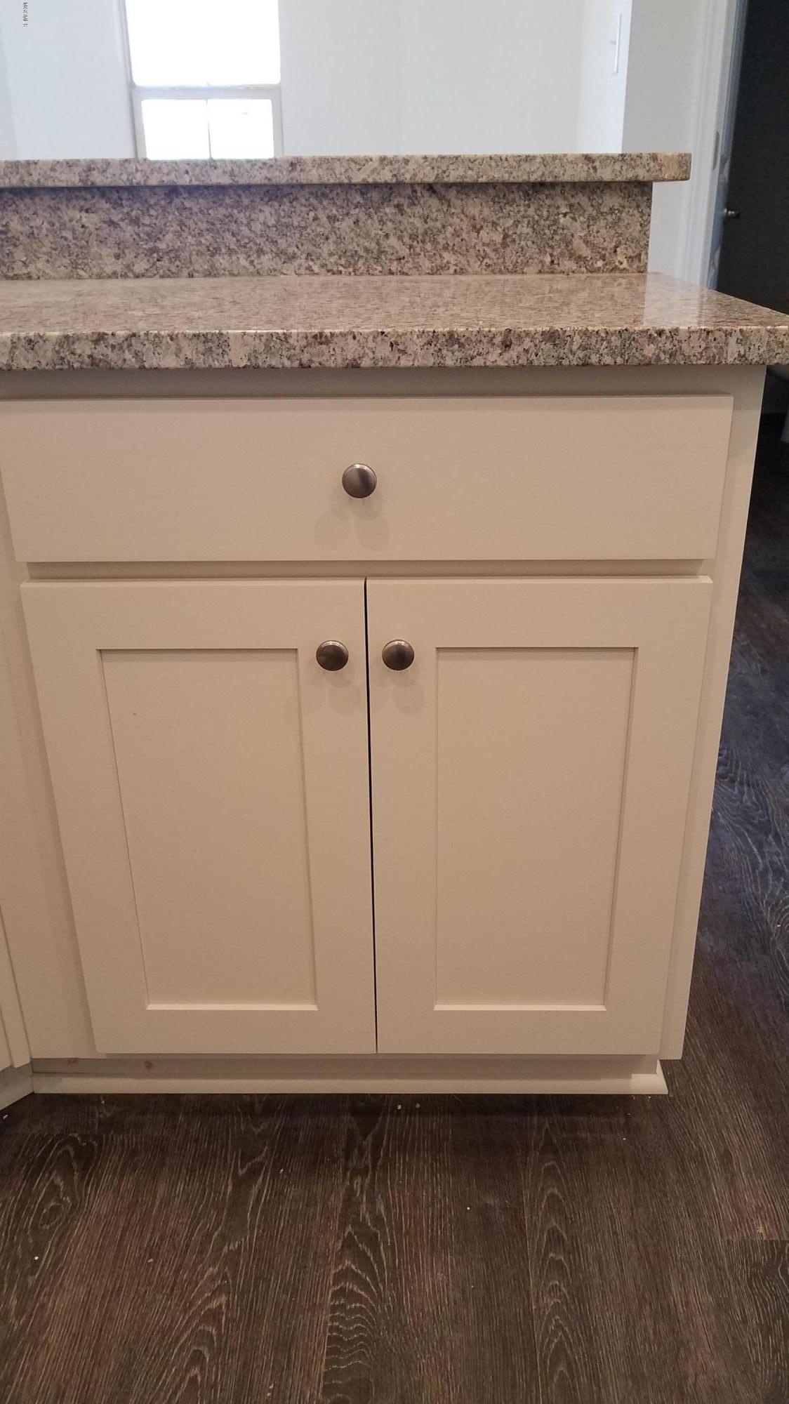 14960 North Swan Road Gulfport, MS 39503 - Photo 3 of 6 Bistro white cabinets