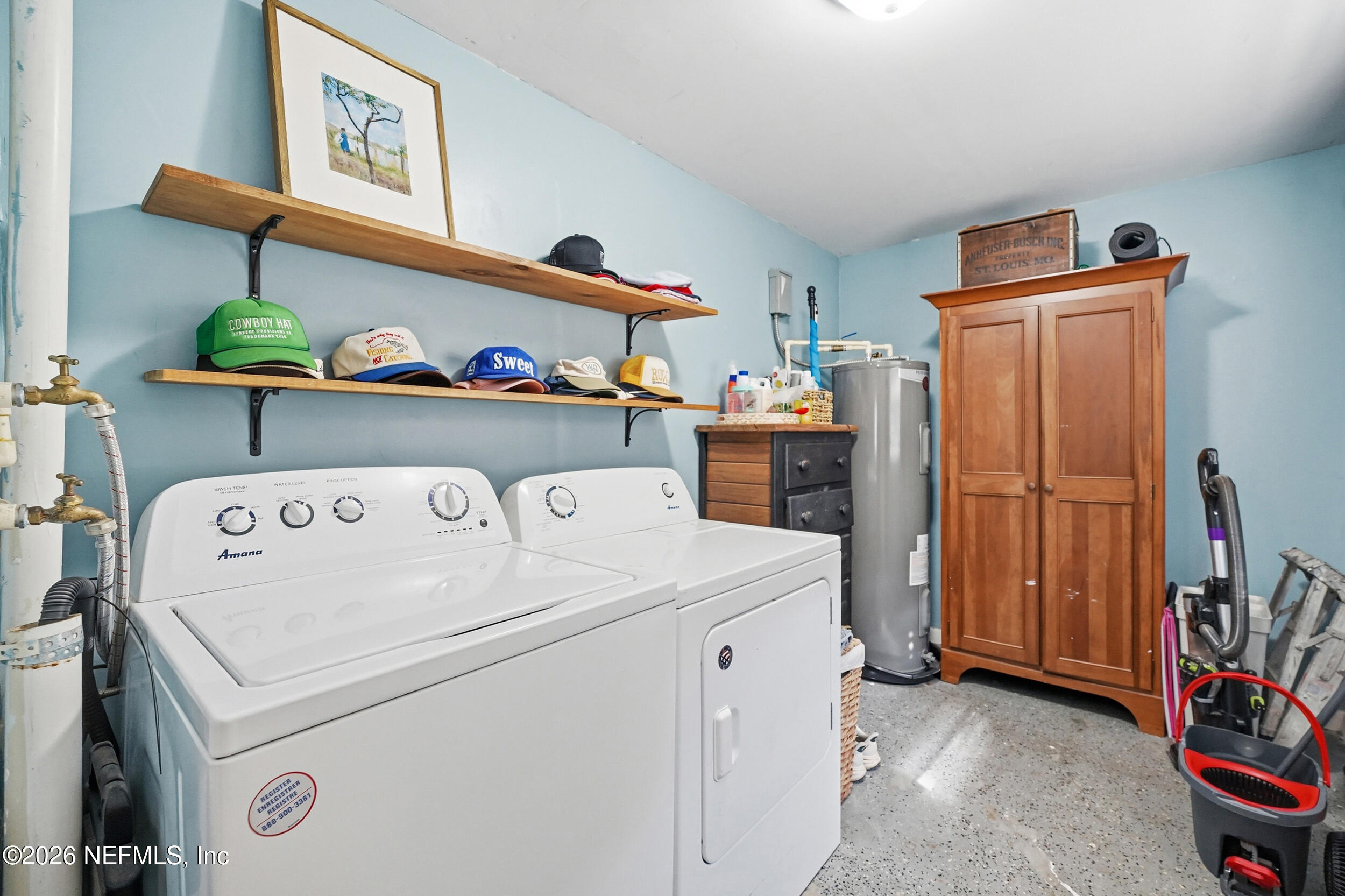 10524 Beverly Nalle Road Jacksonville, FL 32225 - Photo 14 of 28 a utility room with dryer and washer