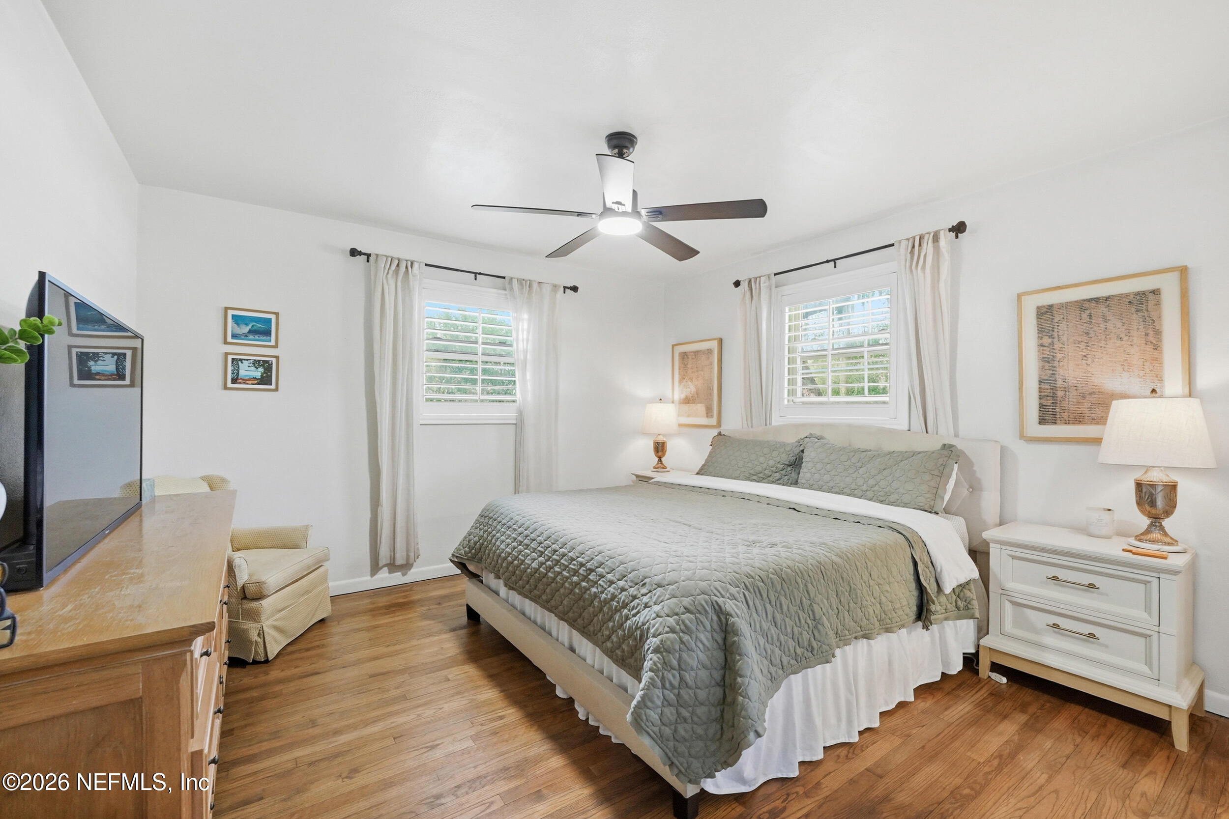 10524 Beverly Nalle Road Jacksonville, FL 32225 - Photo 18 of 28 a bedroom with a bed and a window