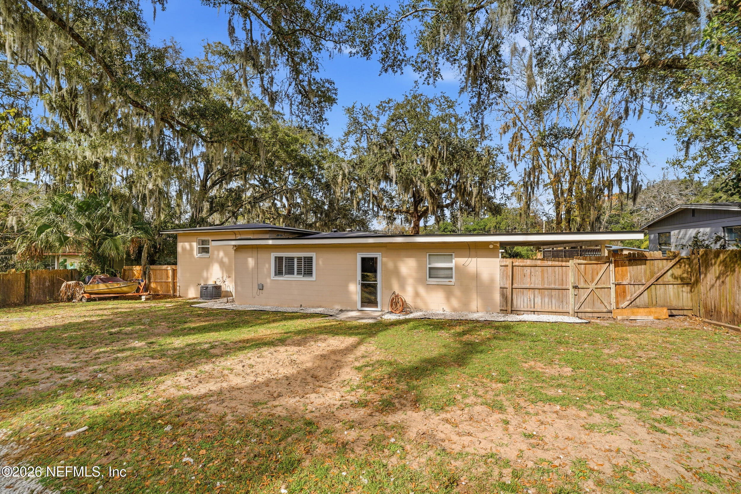 10524 Beverly Nalle Road Jacksonville, FL 32225 - Photo 28 of 28 a view of a house with a yard