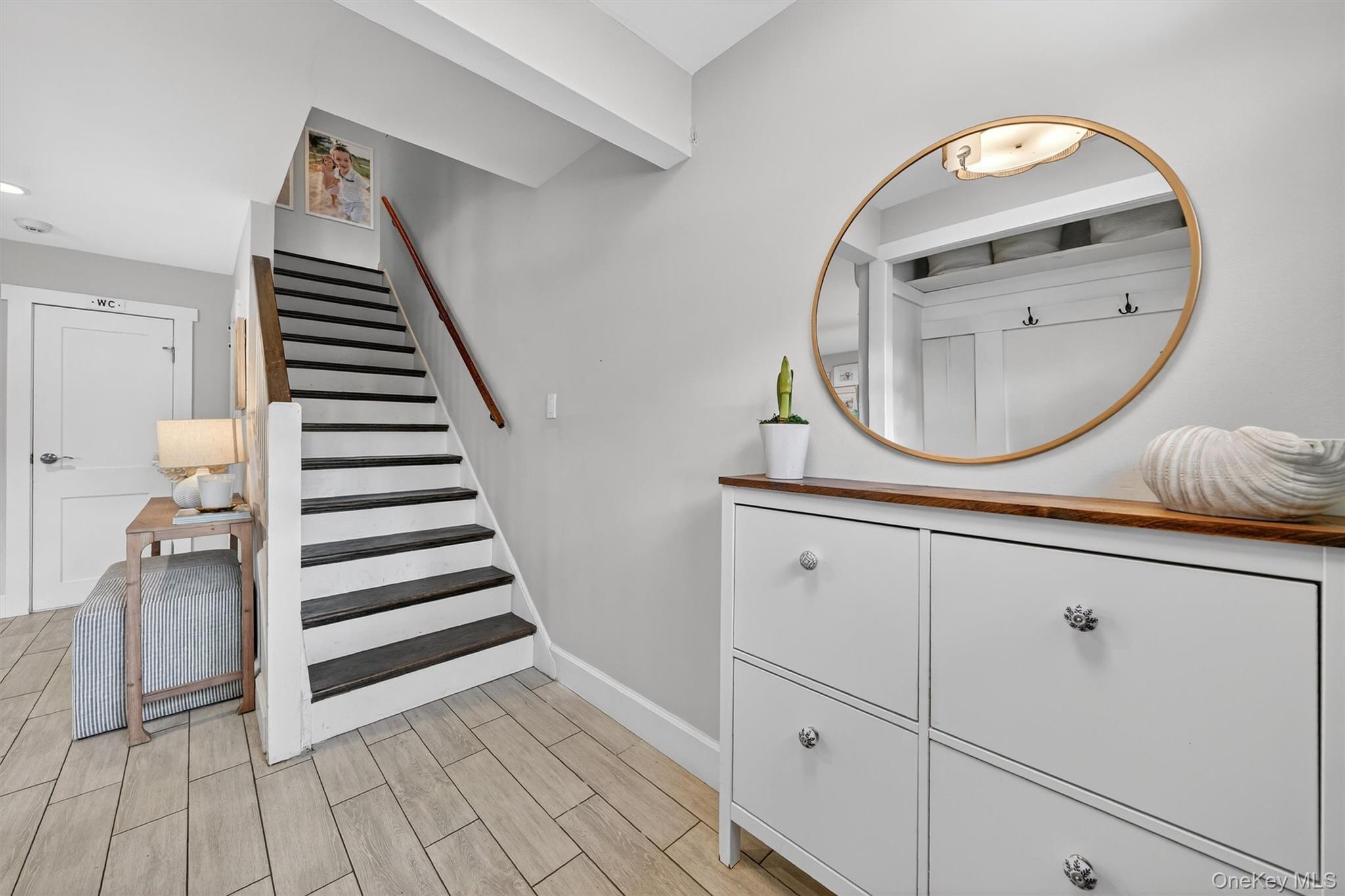 18 Lambert Lane New Rochelle, NY 10804 - Photo 3 of 47 Stairs featuring wood tiled floors and baseboards