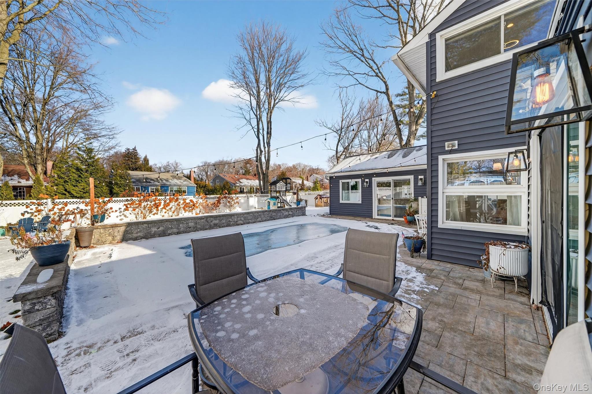 18 Lambert Lane New Rochelle, NY 10804 - Photo 39 of 47 View of patio / terrace with an outdoor pool and outdoor dining area