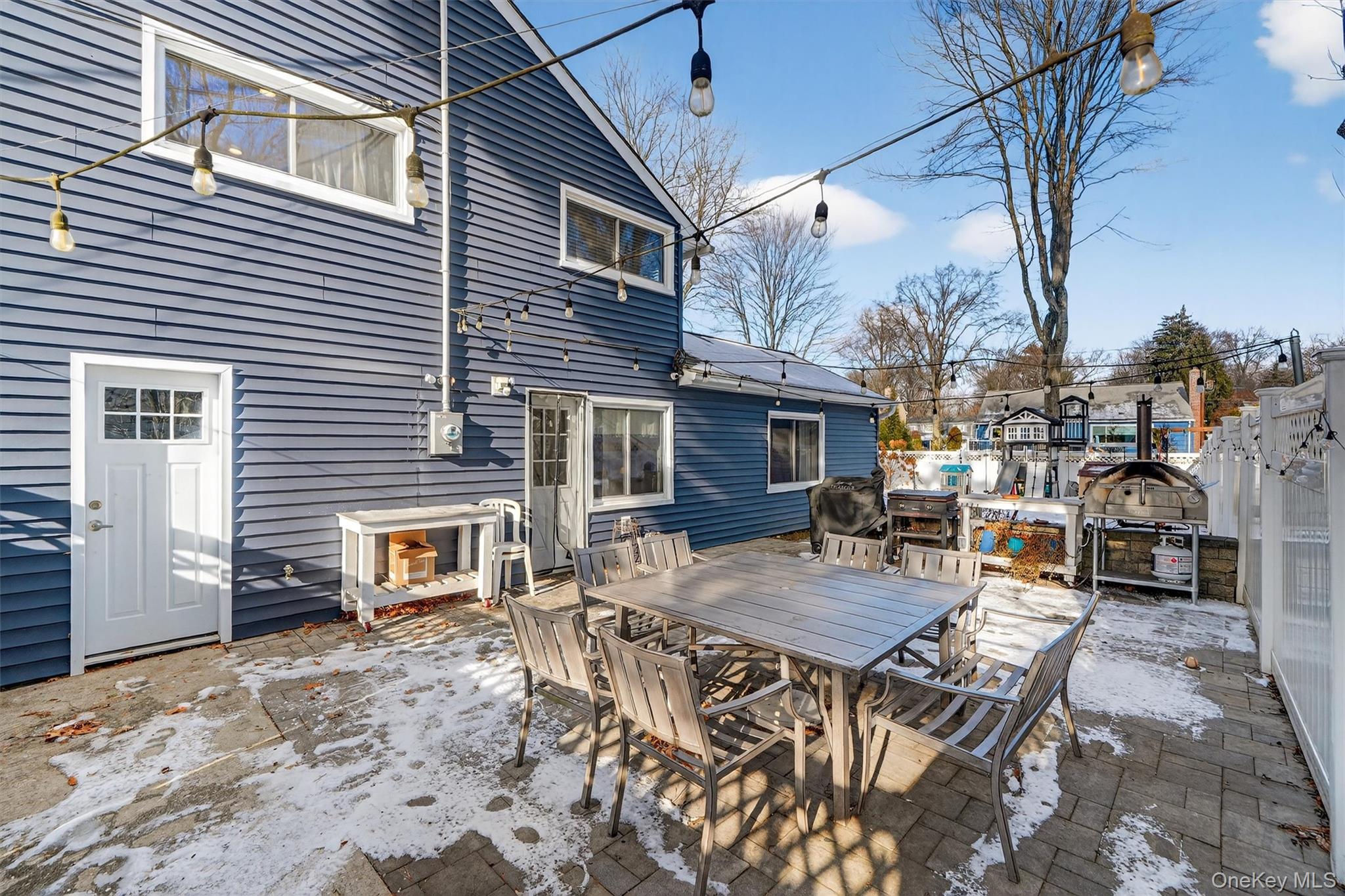 18 Lambert Lane New Rochelle, NY 10804 - Photo 40 of 47 View of patio with outdoor dining area