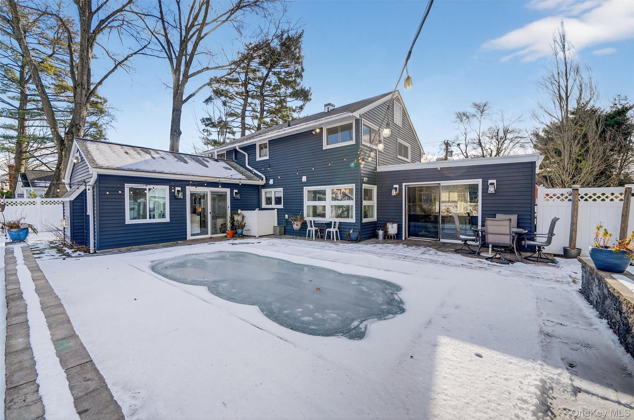 18 Lambert Lane New Rochelle, NY 10804 - Photo 44 of 47 Rear view of house with a patio
