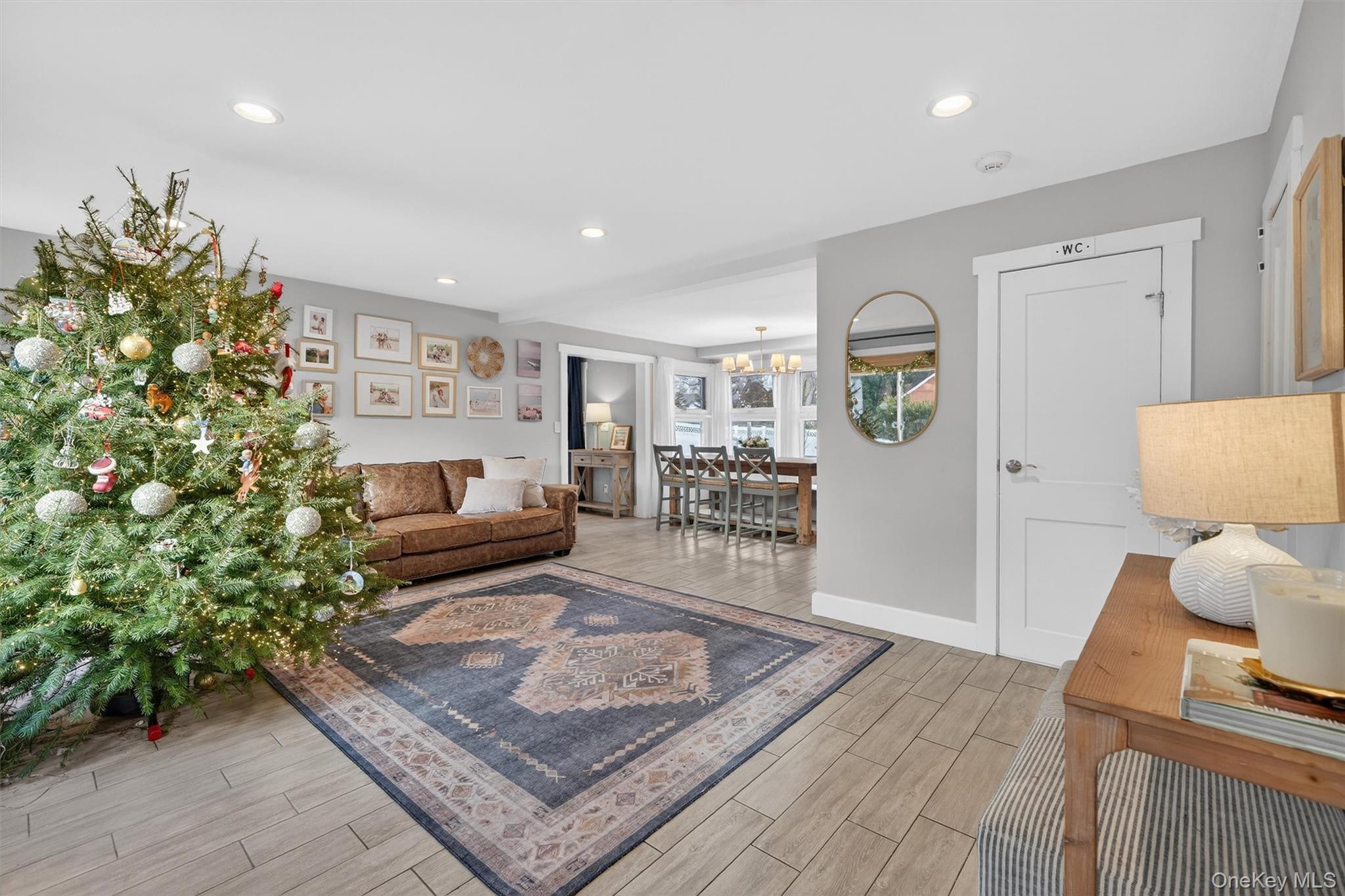 18 Lambert Lane New Rochelle, NY 10804 - Photo 6 of 47 Living room with wood tiled floors and recessed lighting