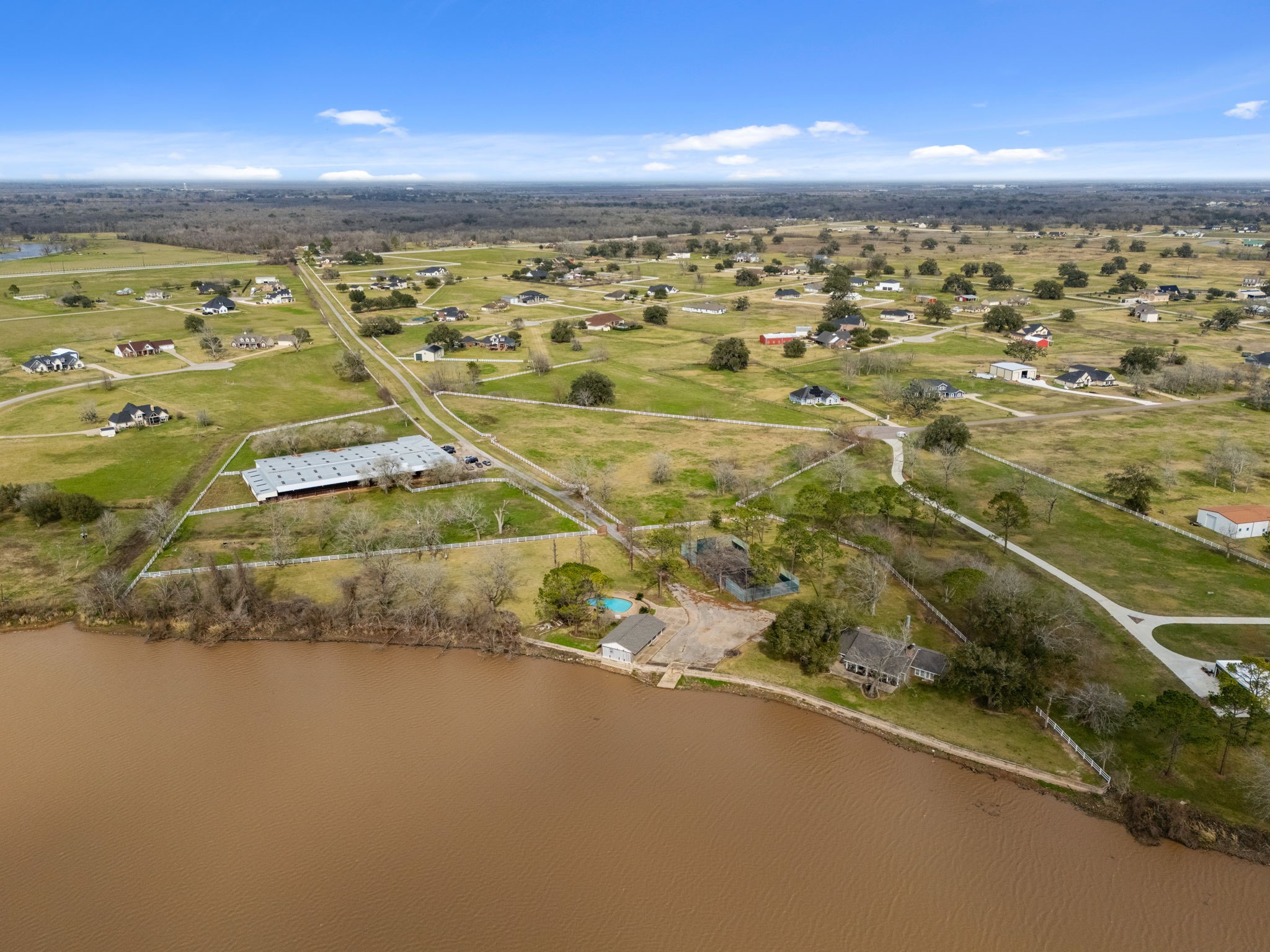 2935 West Fm 1462 Rosharon, TX 77583 - Photo 8 of 50 This expansive aerial view highlights the full scope of the ranch and its surrounding countryside.