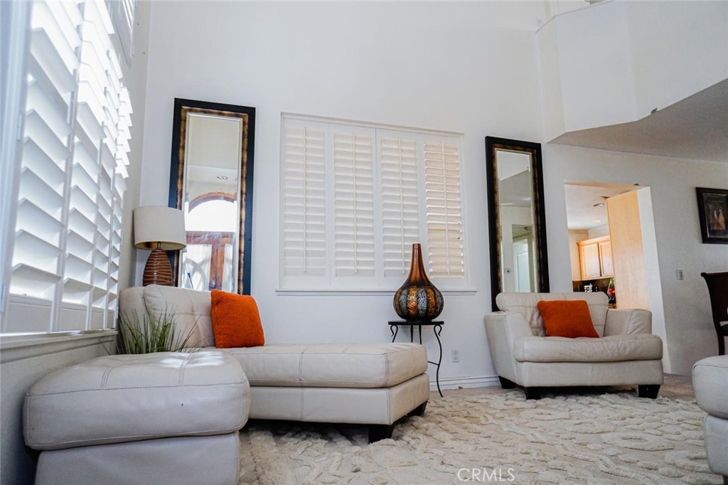 507 Lassa Way Perris, CA 92571 - Photo 13 of 36 a living room with furniture and a lamp