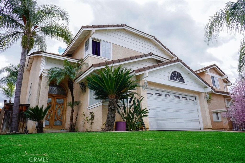 507 Lassa Way Perris, CA 92571 - Photo 3 of 36 a front view of house with yard and outdoor seating