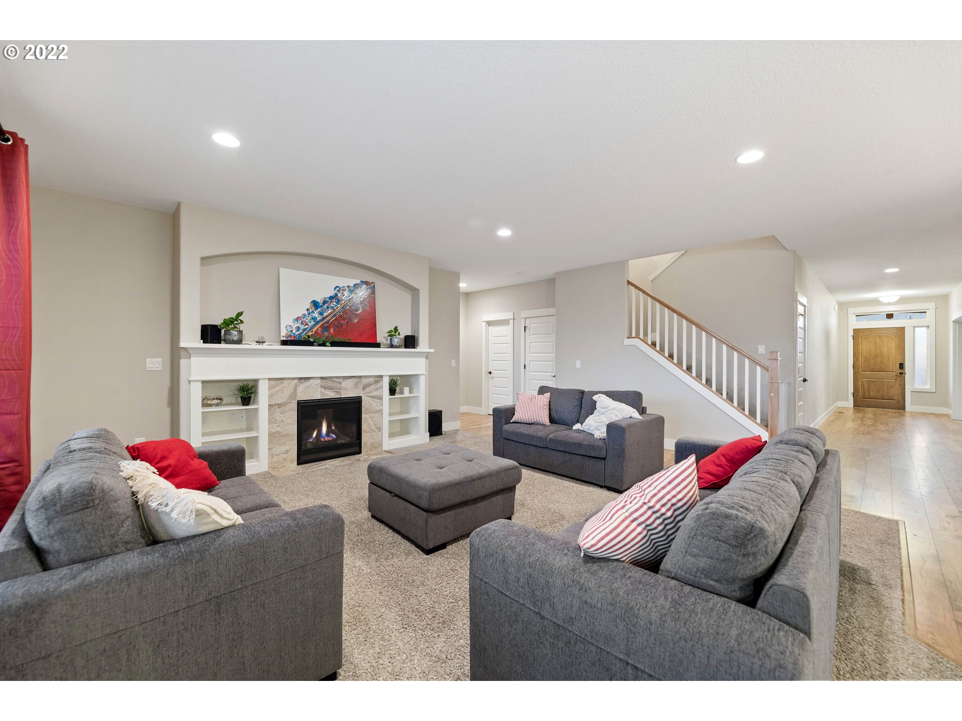 4616 South 16th Drive Ridgefield, WA 98642 - Photo 12 of 28 a living room with furniture or couch and a fireplace