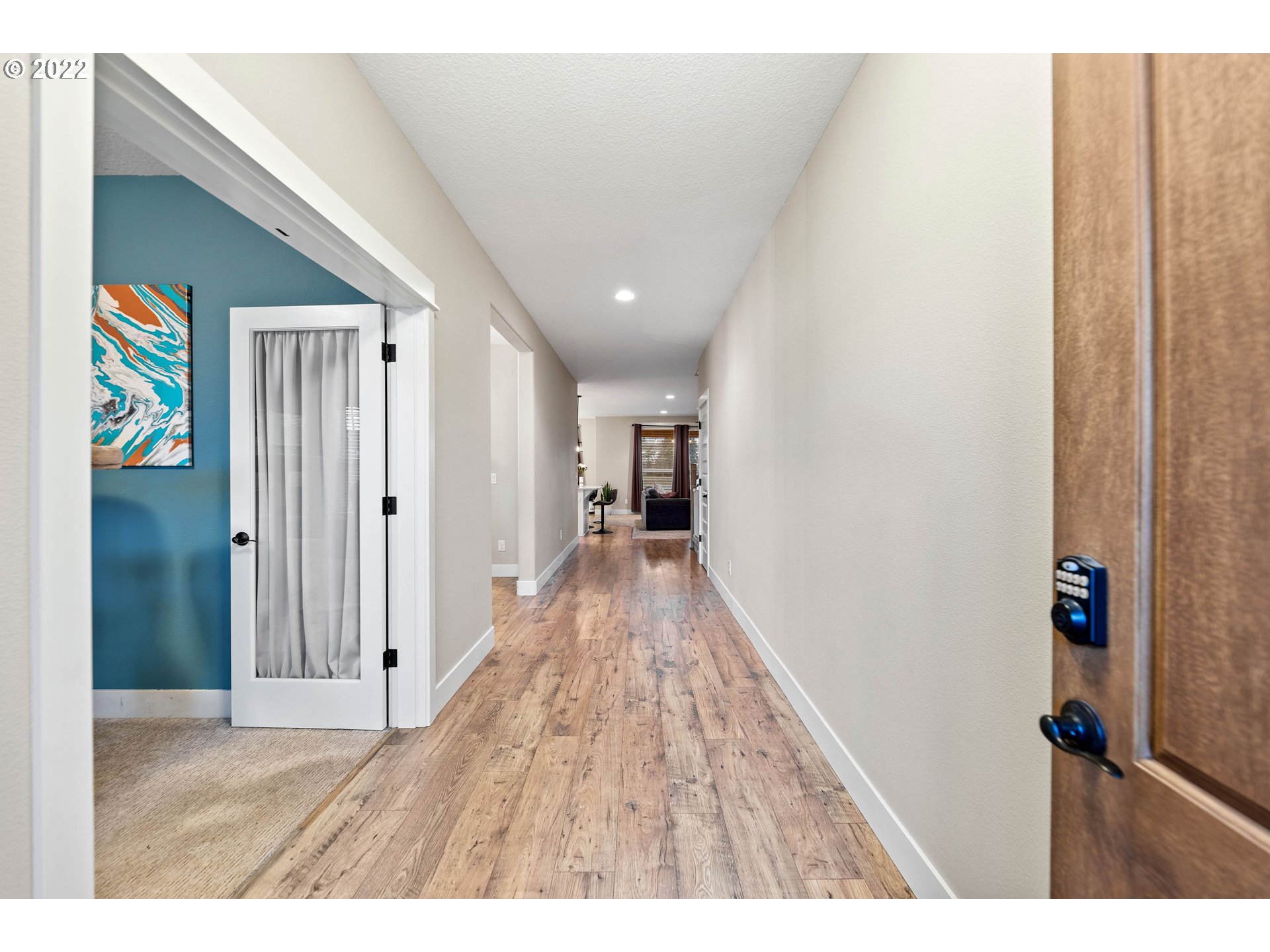4616 South 16th Drive Ridgefield, WA 98642 - Photo 2 of 28 a view of hallway with wooden floor