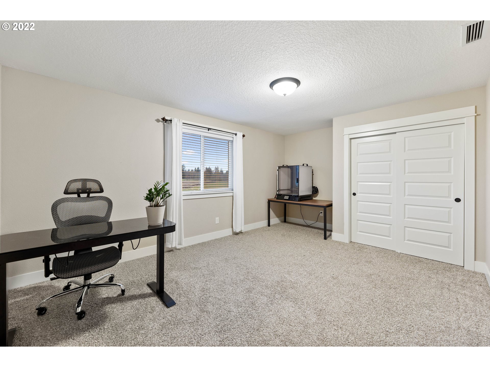 4616 South 16th Drive Ridgefield, WA 98642 - Photo 21 of 28 a view of a workspace with furniture