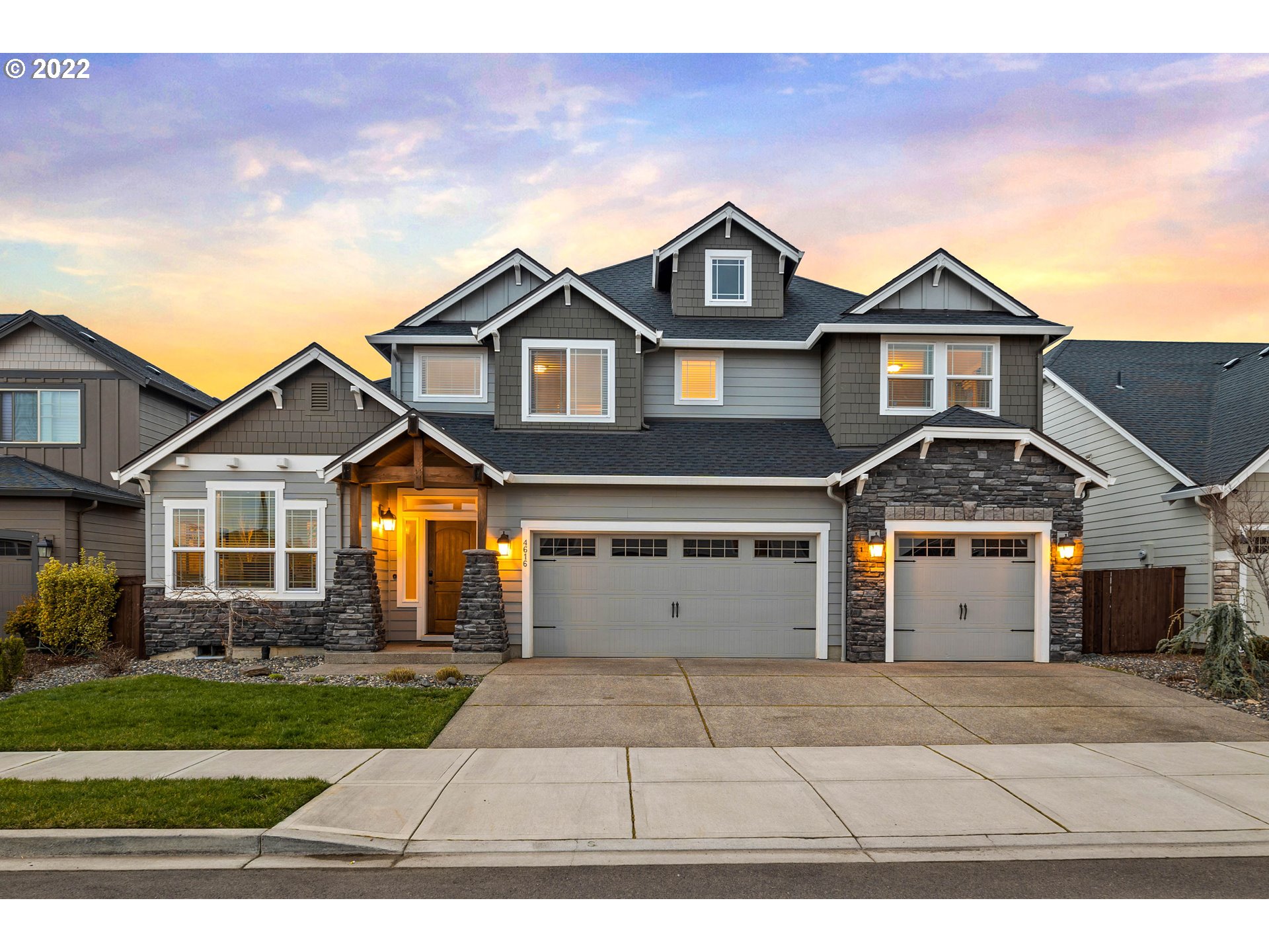 4616 South 16th Drive Ridgefield, WA 98642 - Photo 25 of 28 a front view of a house with a yard