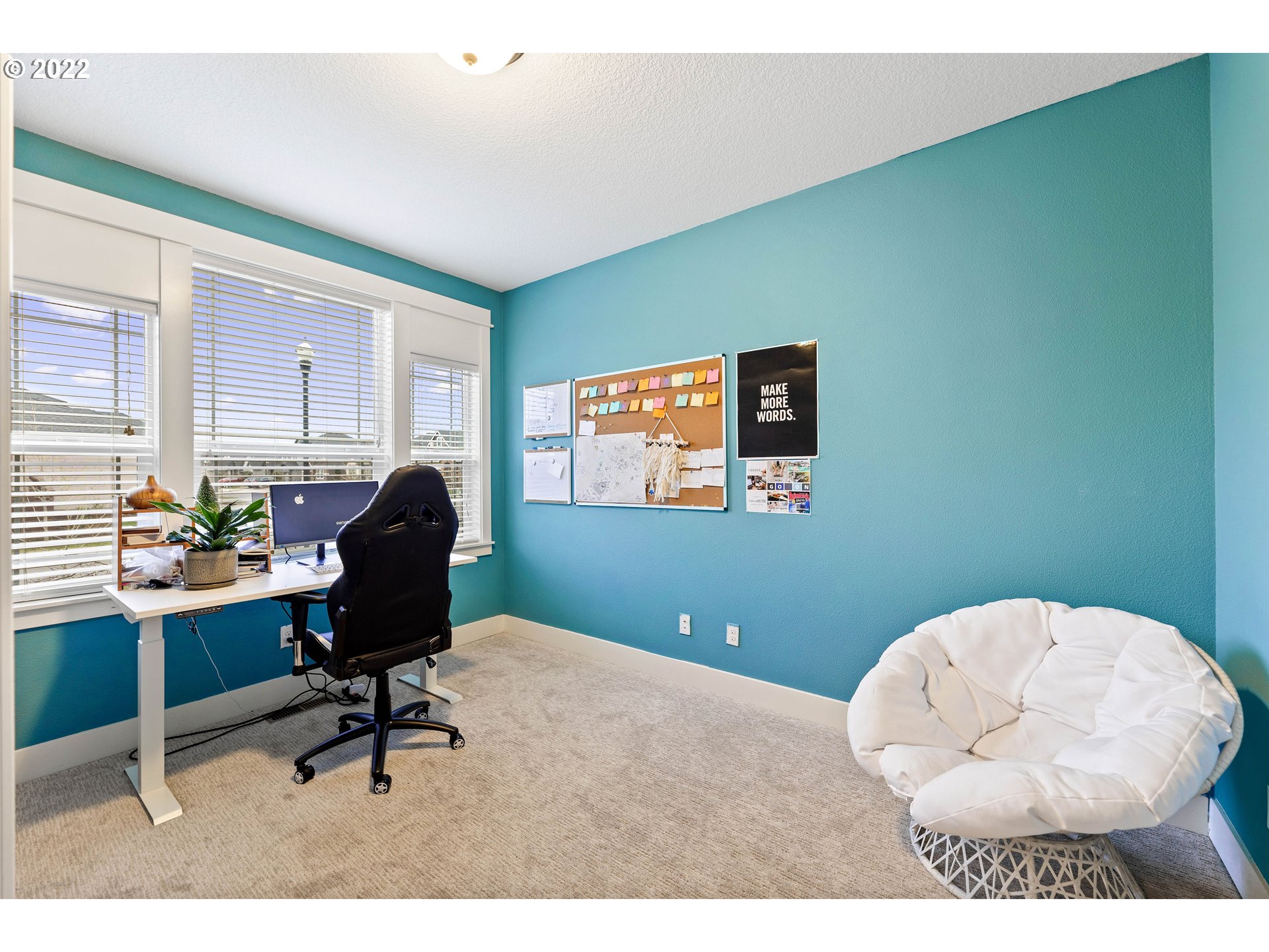 4616 South 16th Drive Ridgefield, WA 98642 - Photo 4 of 28 a workspace with furniture and a window