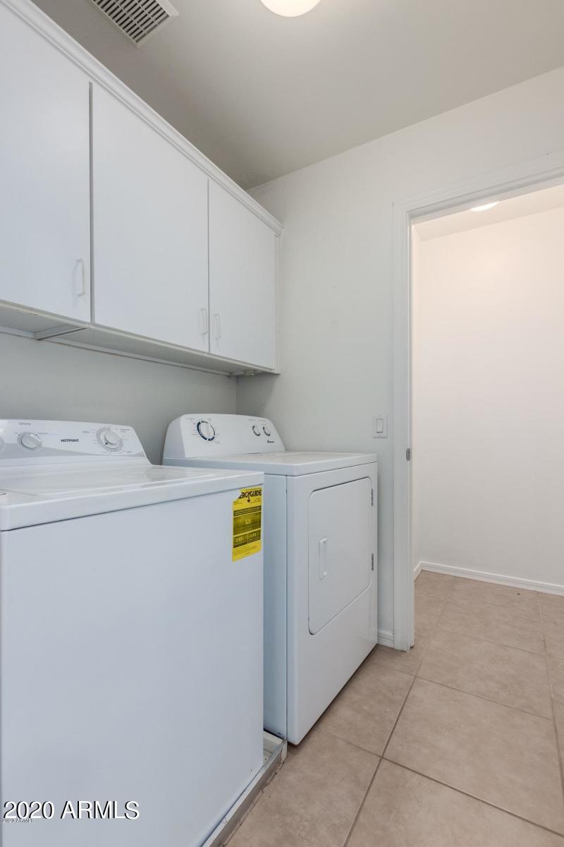 2023 West Davis Road Phoenix, AZ 85023 - Photo 8 of 16 a utility room with dryer and washer