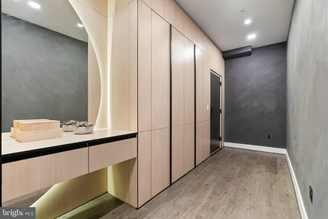 a view of a hallway with windows