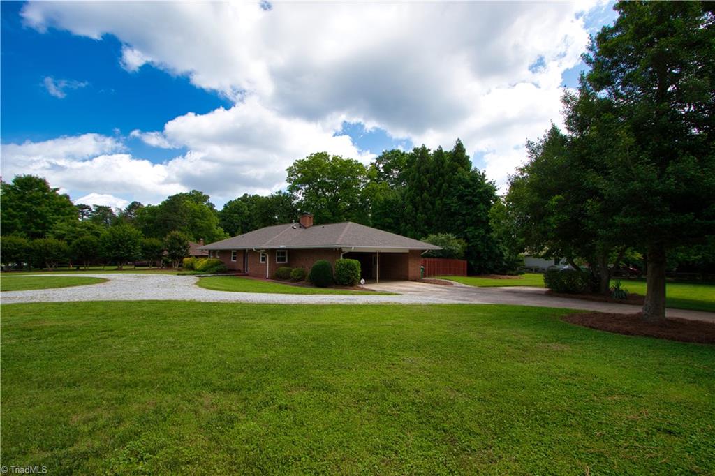 2303 Gordon Road High Point, NC 27265 - Photo 2 of 29 Semi Circle Drive & Side Entry Carport