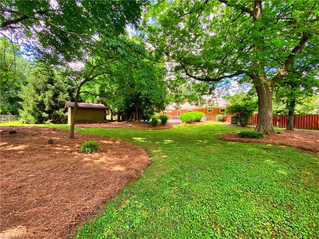 2303 Gordon Road High Point, NC 27265 - Photo 22 of 29 Lush Backyard